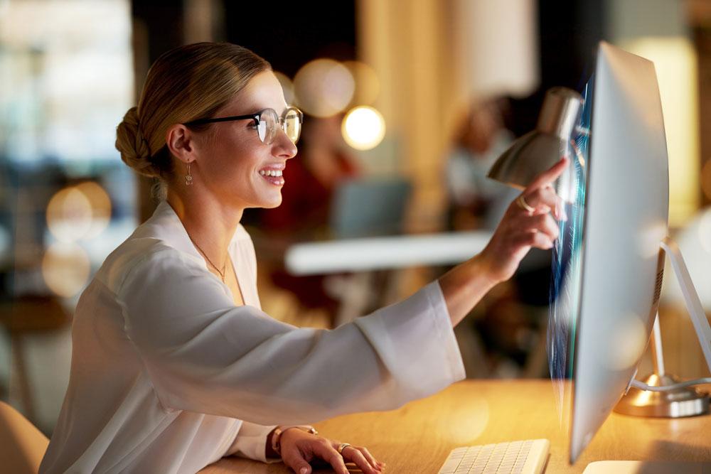 Smiling woman viewing GoBuild account history