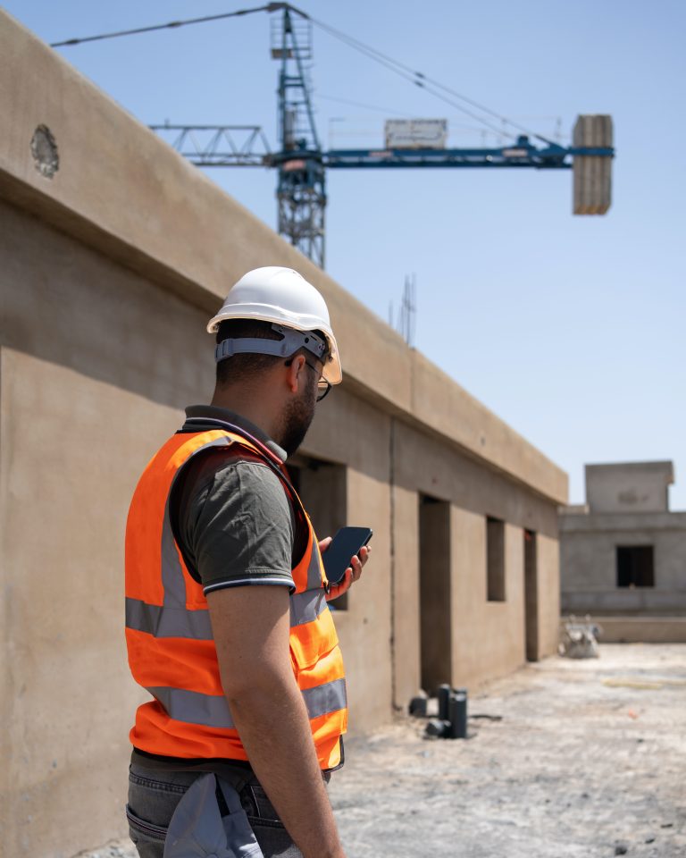 Worker-ordering-cement-from-mobile-app